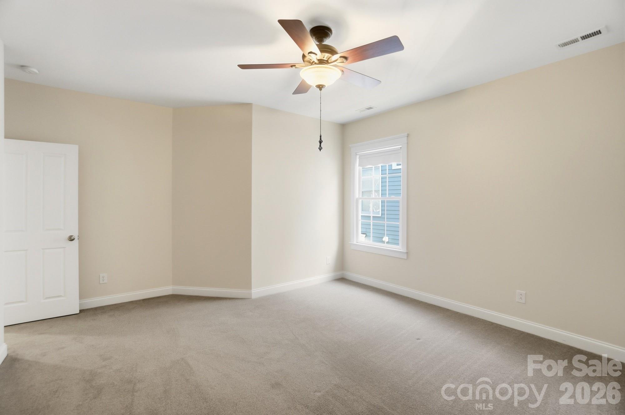 159 Lavender Bloom Loop Mooresville, NC 28115 - Photo 34 of 48 a view of an empty room with a window