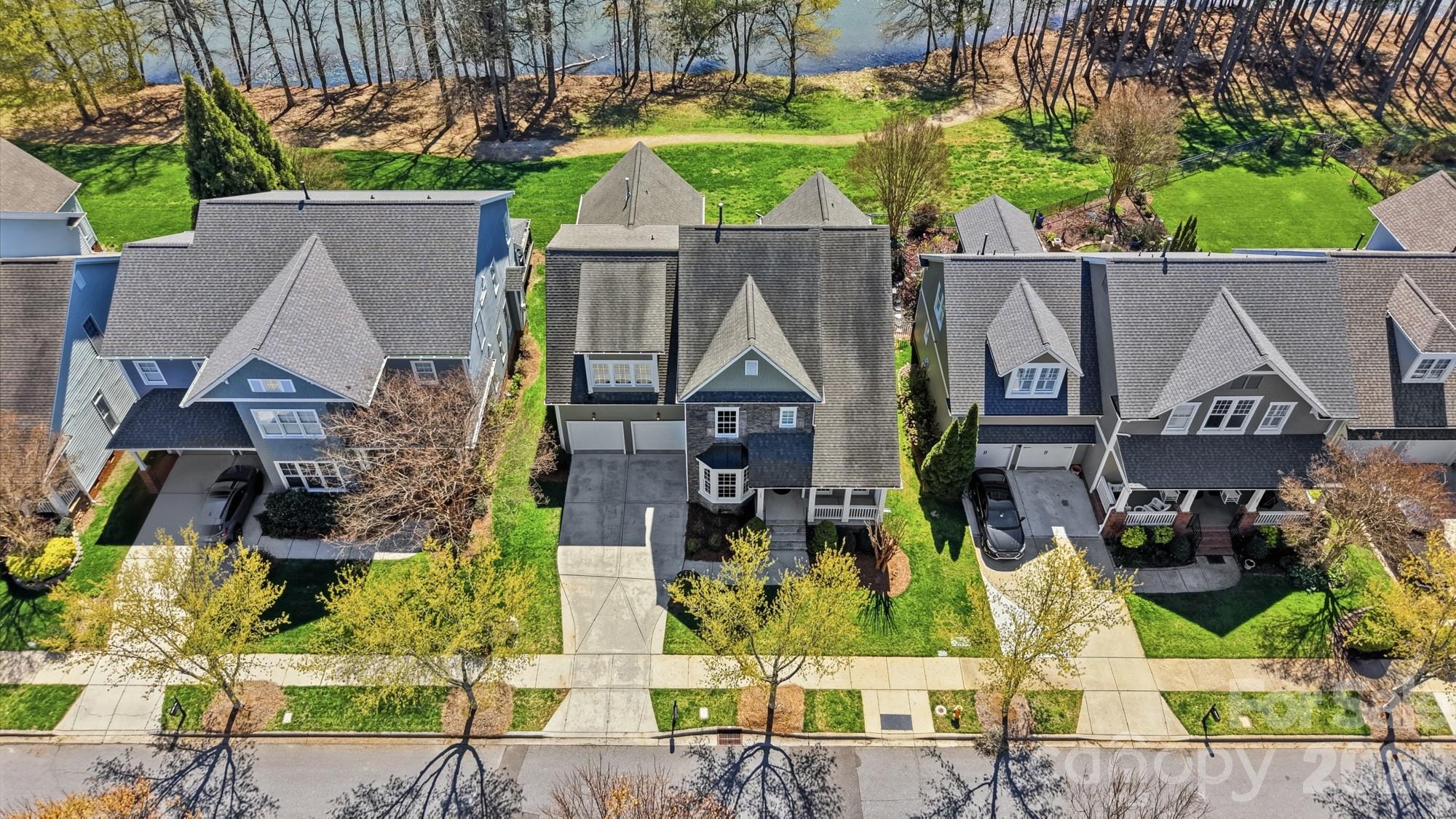 159 Lavender Bloom Loop Mooresville, NC 28115 - Photo 4 of 48 an aerial view of multiple house