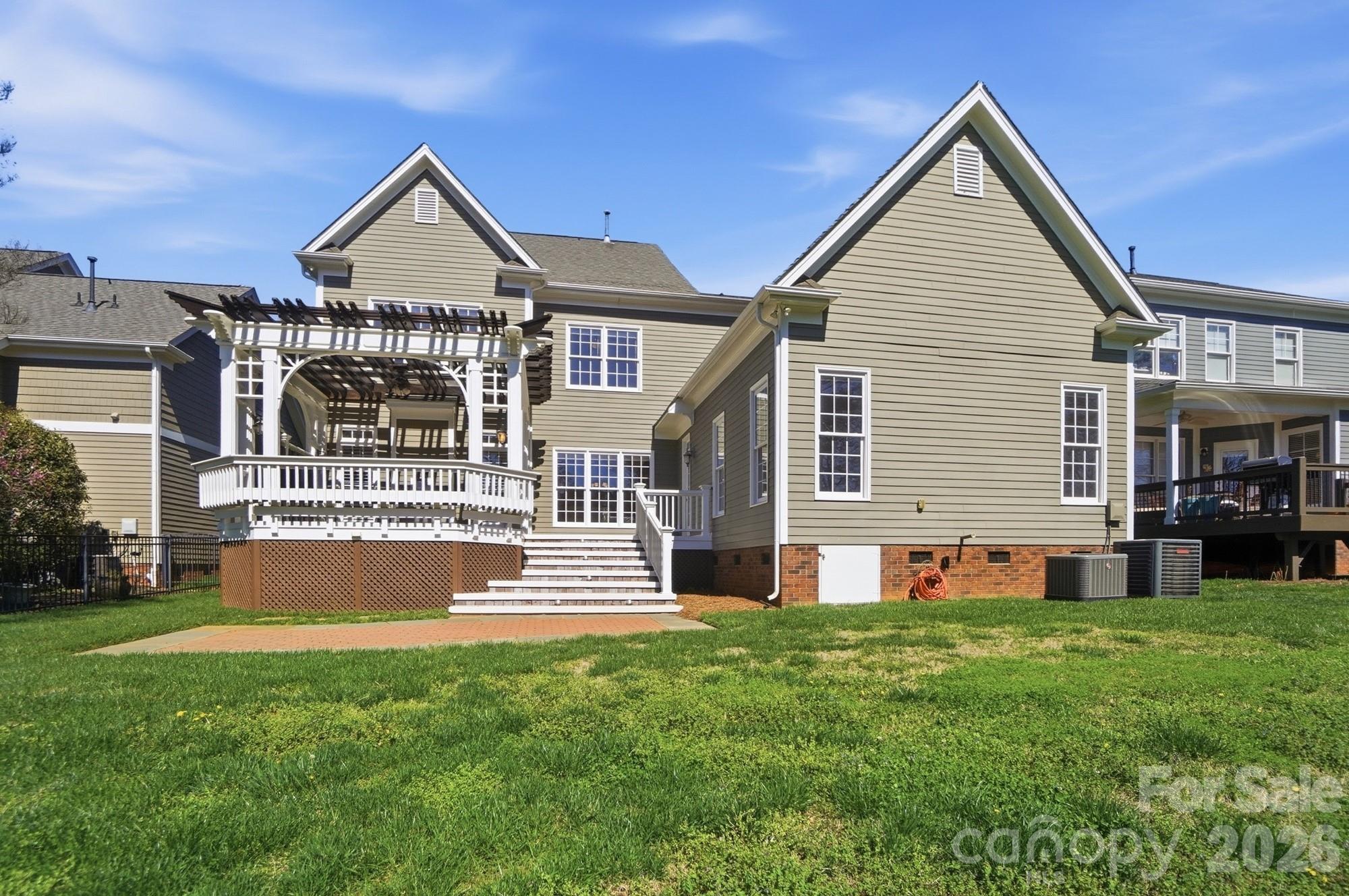 159 Lavender Bloom Loop Mooresville, NC 28115 - Photo 41 of 48 a front view of a house with a yard