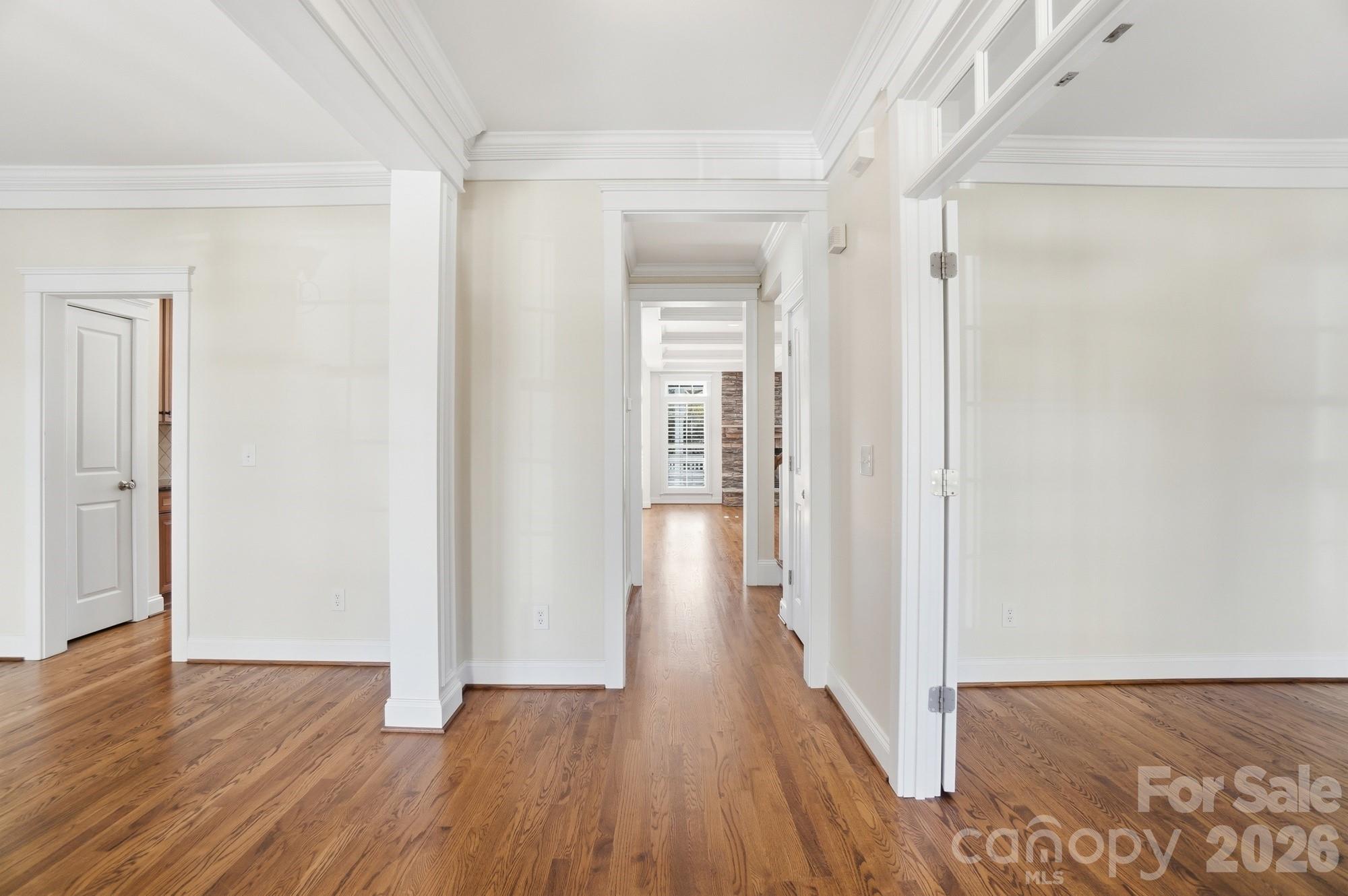 159 Lavender Bloom Loop Mooresville, NC 28115 - Photo 6 of 48 a view of a hallway with wooden floor
