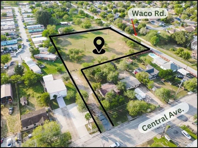 a dining room with furniture and a rug