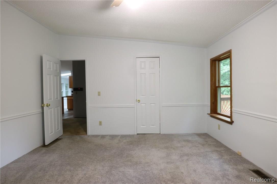 11509 Hall Road Whitmore Lake, MI 48189 - Photo 12 of 33 Reverse view master - door center into walk in closet