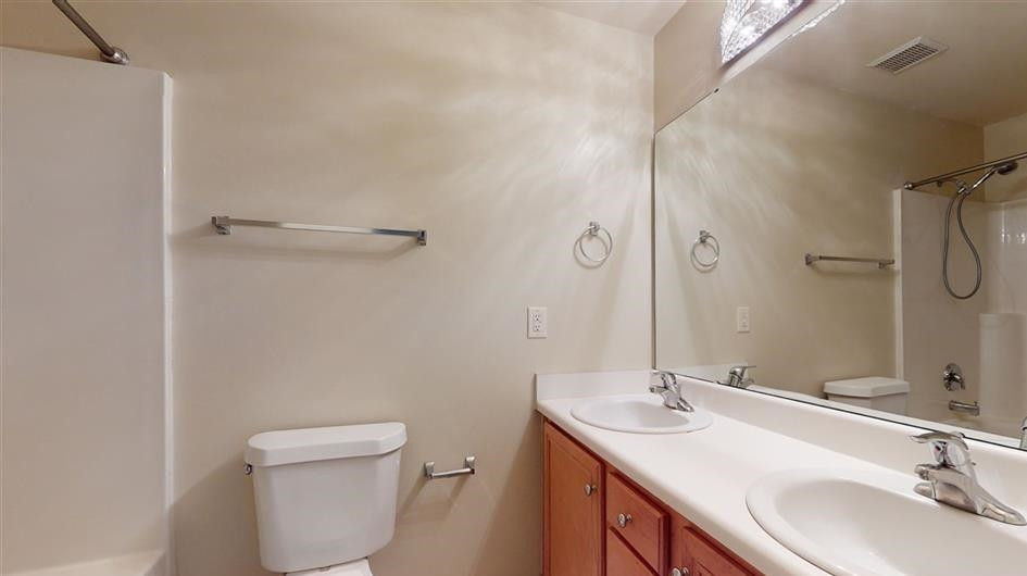 2225 Banks Hill Row Road Raleigh, NC 27614 - Photo 14 of 26 Double vanity with two sinks. Pictures are from 2020 prior to tenant occupancy. Main Bath
