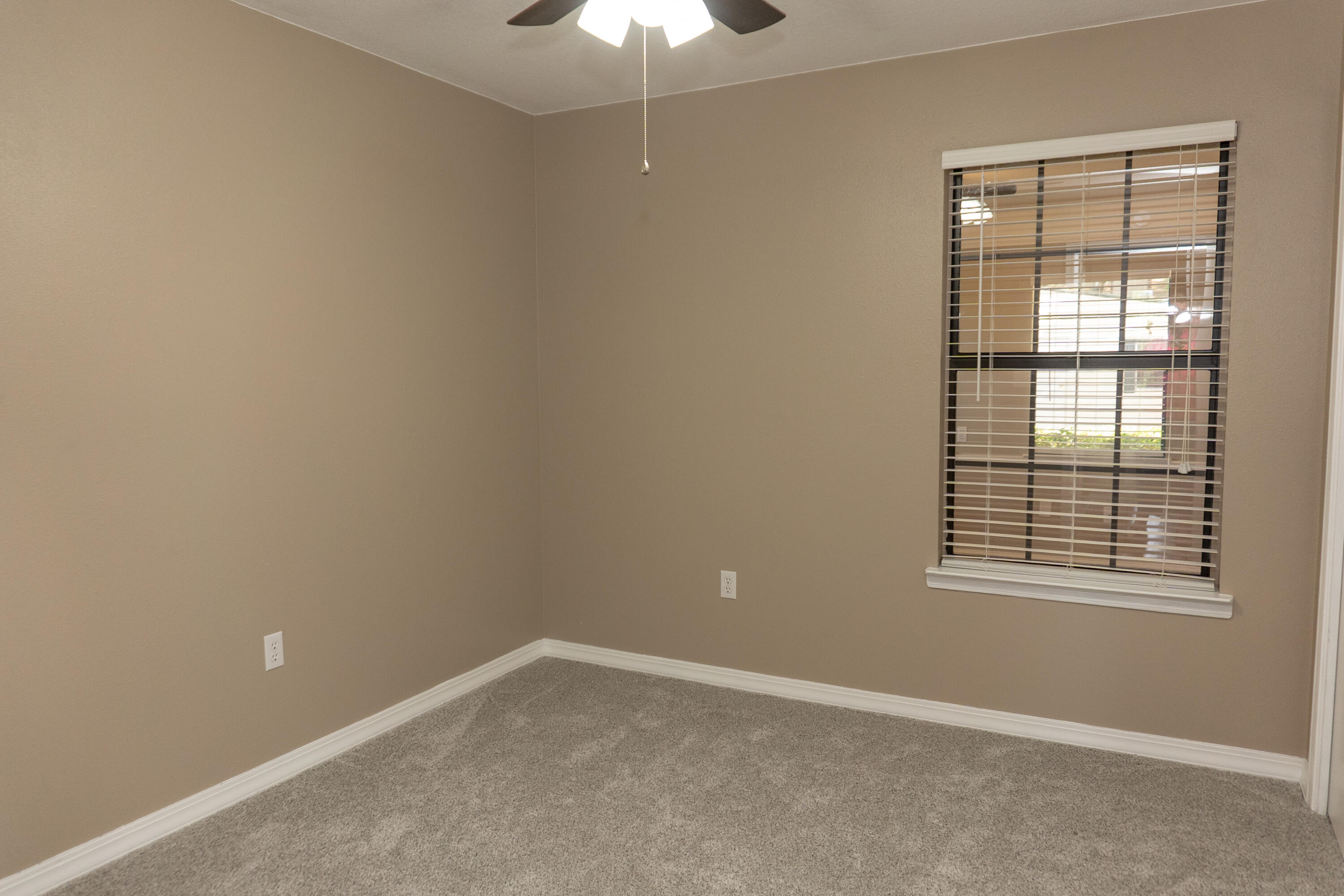 102 Brian Drive Crestview, FL 32536 - Photo 11 of 23 an empty room with a window
