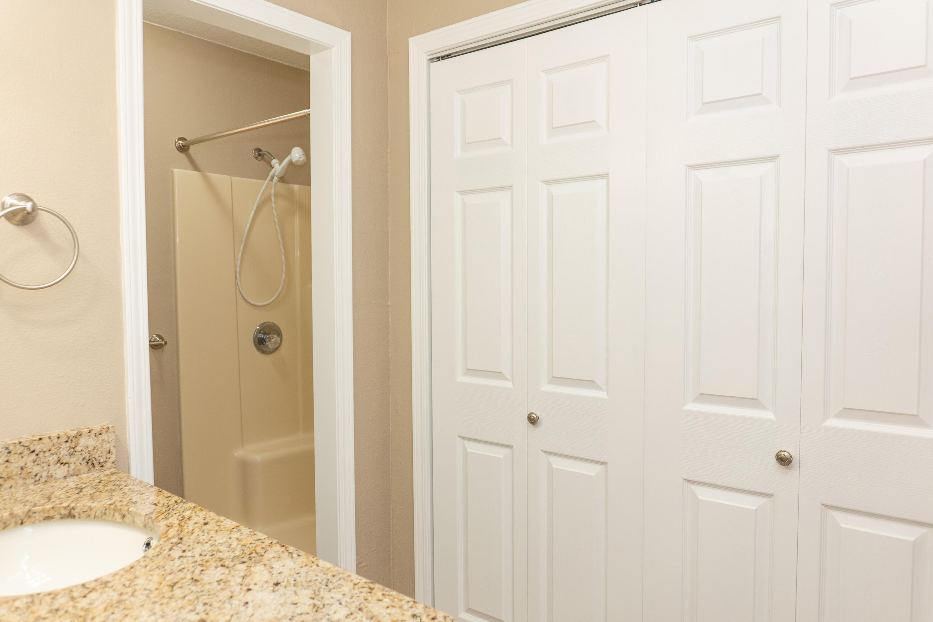 102 Brian Drive Crestview, FL 32536 - Photo 19 of 23 a bathroom with a granite countertop sink and a mirror