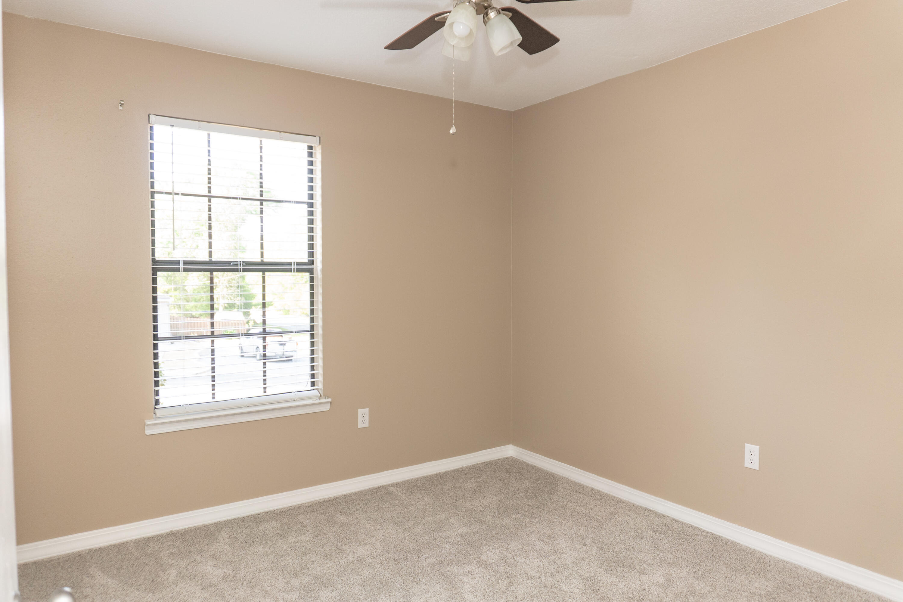 102 Brian Drive Crestview, FL 32536 - Photo 9 of 23 an empty room with a window