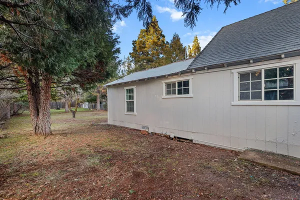 a house with trees in front of it