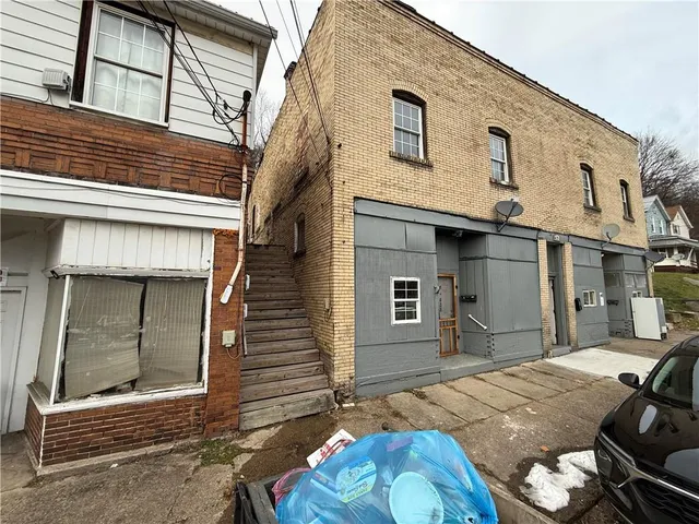 a view of a house with a patio
