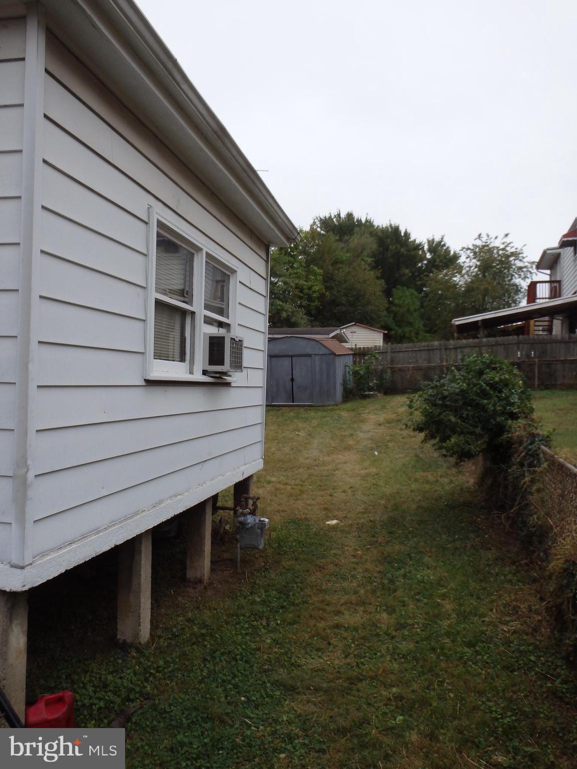 1123 Quebec Street Silver Spring, MD 20903 - Photo 3 of 29 Side extension