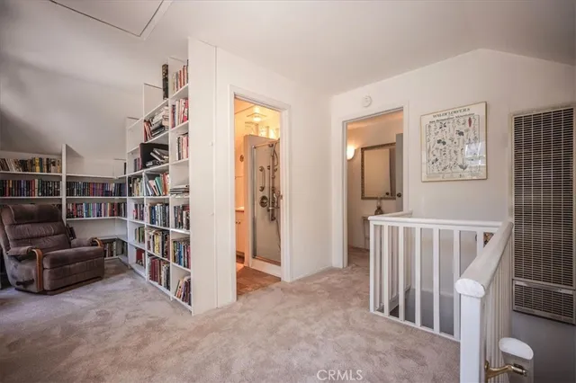 a view of livingroom with furniture and workspace