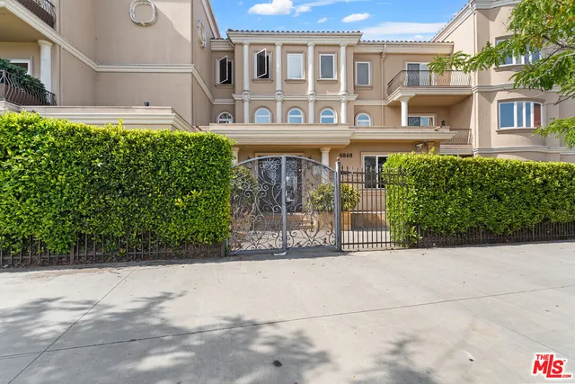 a view of a building with a street