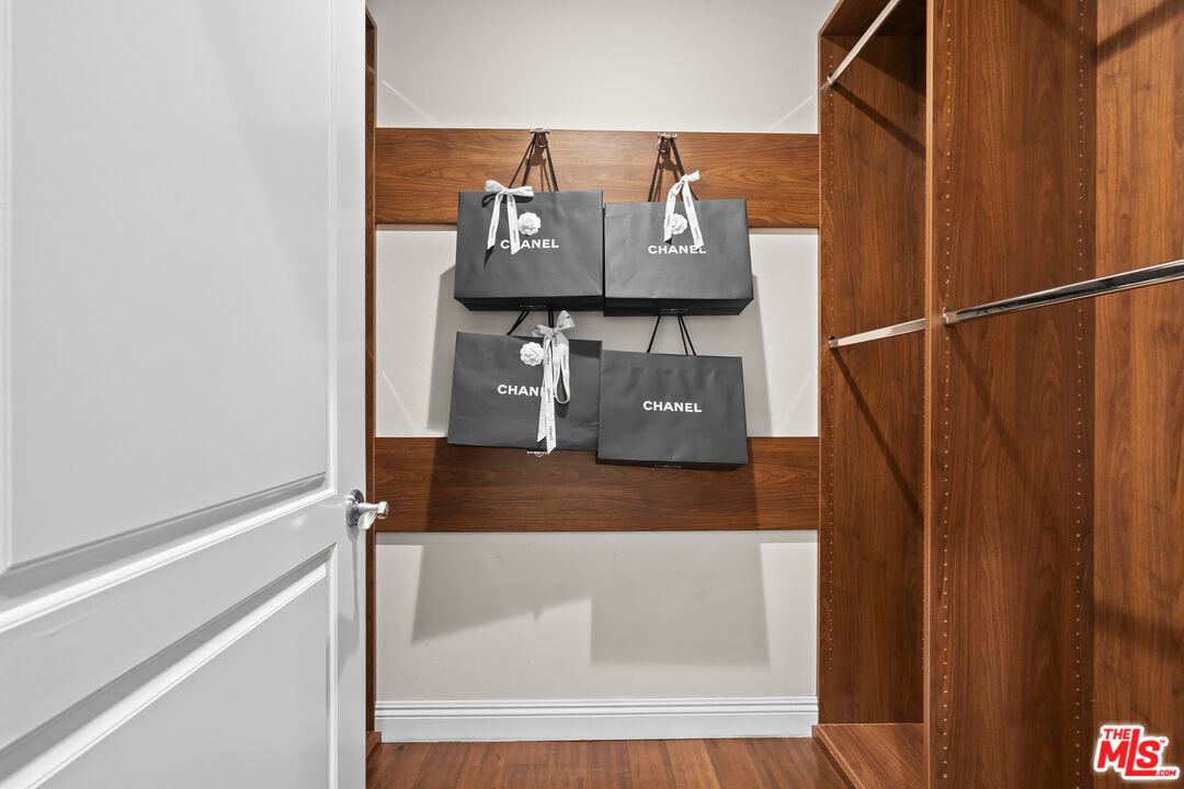 4848 Wilshire Boulevard, Unit 102 Los Angeles, CA 90036 - Photo 32 of 47 a bathroom with a shower and a sink