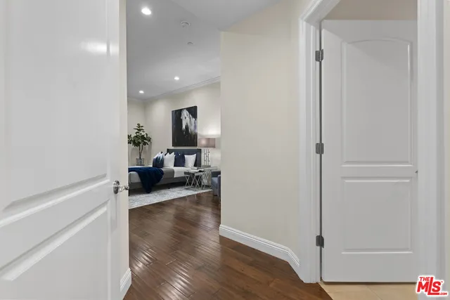 a living room with furniture rug and window