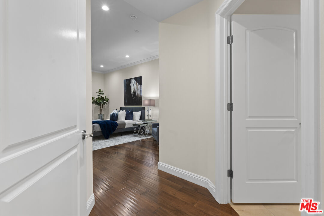 4848 Wilshire Boulevard, Unit 102 Los Angeles, CA 90036 - Photo 37 of 47 a view of living room with furniture and wooden floor