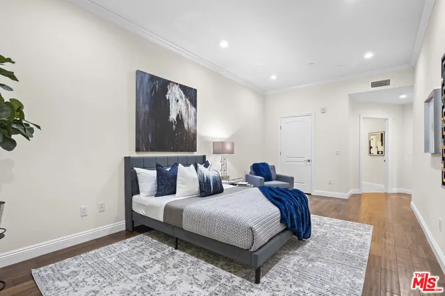 a living room with furniture rug and window