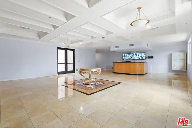a view of kitchen with furniture and a window