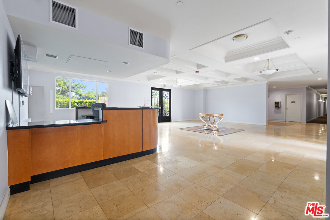 4848 Wilshire Boulevard, Unit 102 Los Angeles, CA 90036 - Photo 6 of 47 a view of kitchen with furniture and a window