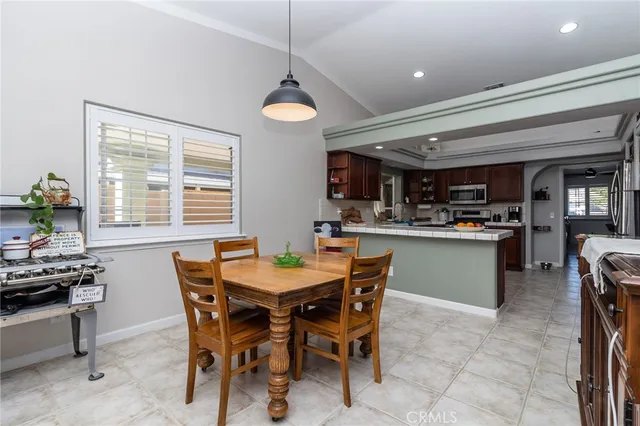 a view of a dining room with furniture