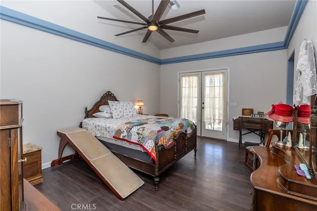 a bedroom with a bed and a table