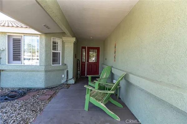 a room with chair and window
