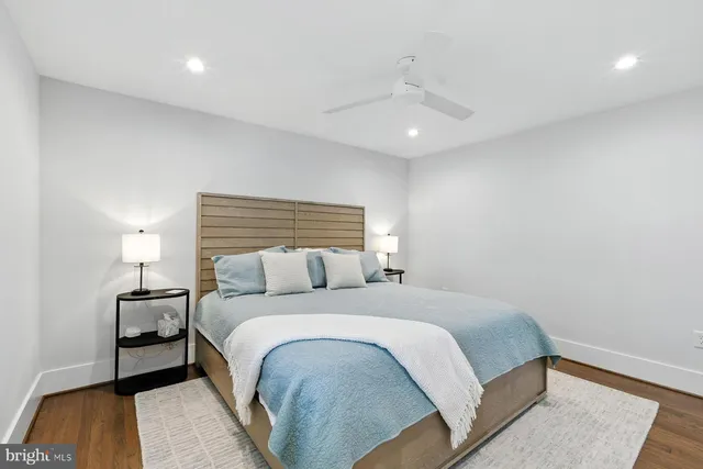 a bathroom with a shower toilet and sink