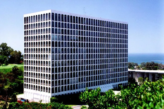 a view of a building with a garden