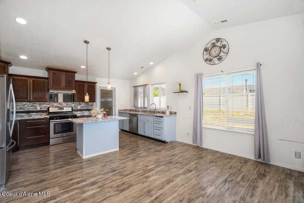 1704 North Pyroclast Street Post Falls, ID 83854 - Photo 6 of 35 Dining Room and Island