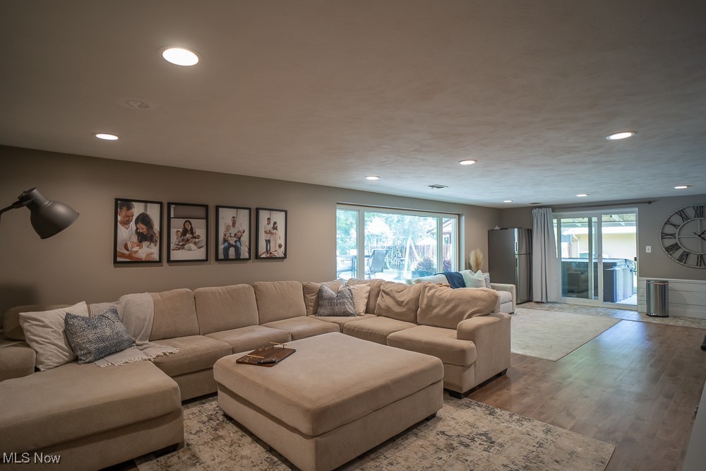 8283 Montello Road Independence, OH 44131 - Photo 20 of 41 Living room featuring light wood-type flooring