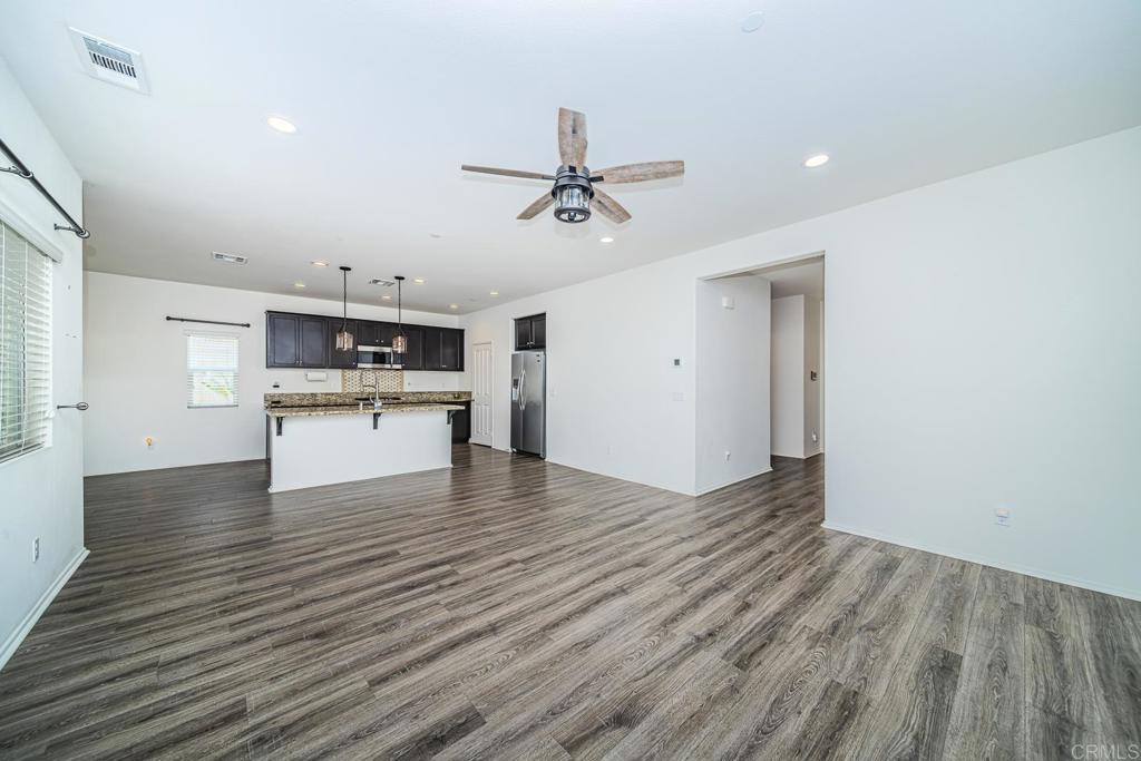 340 Falabella Lane Fallbrook, CA 92028 - Photo 12 of 63 a view of kitchen with wooden floor