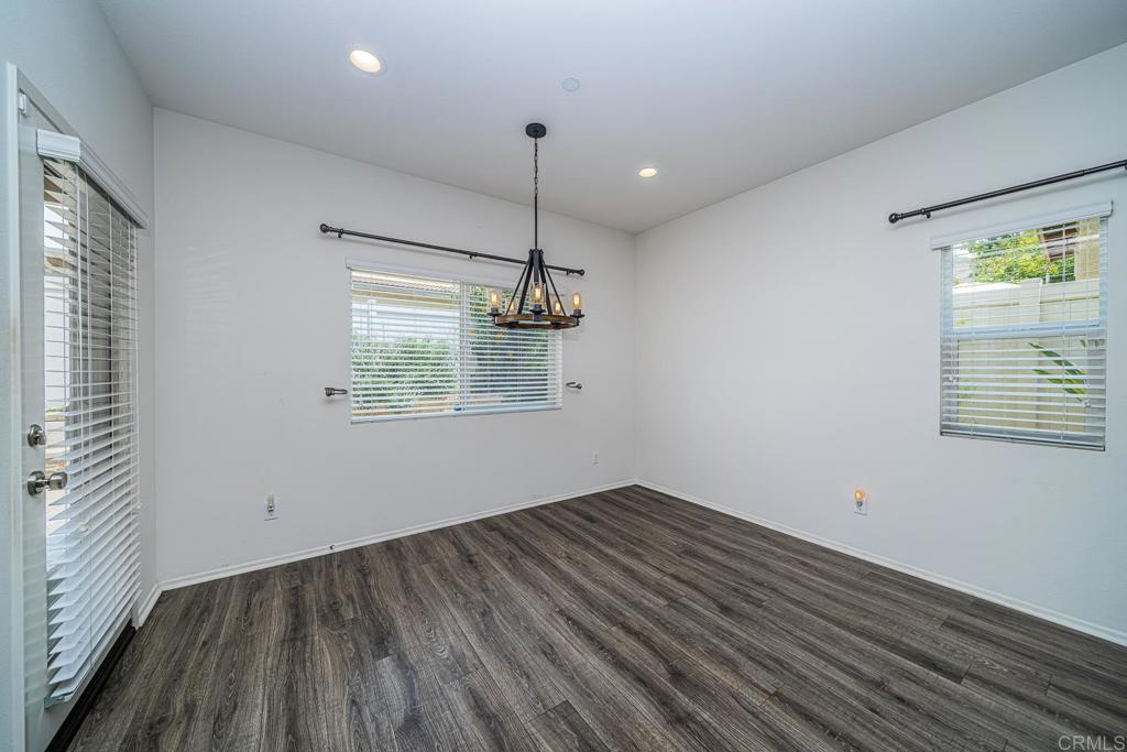 340 Falabella Lane Fallbrook, CA 92028 - Photo 20 of 63 wooden floor in an empty room with a window