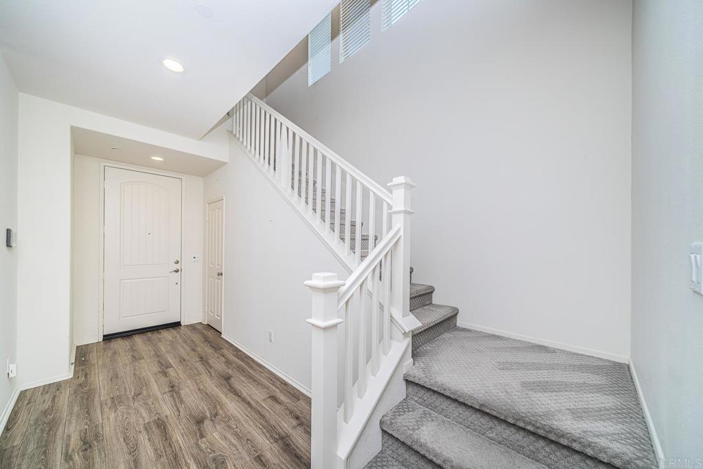 340 Falabella Lane Fallbrook, CA 92028 - Photo 30 of 63 a view of entryway and hall with wooden floor