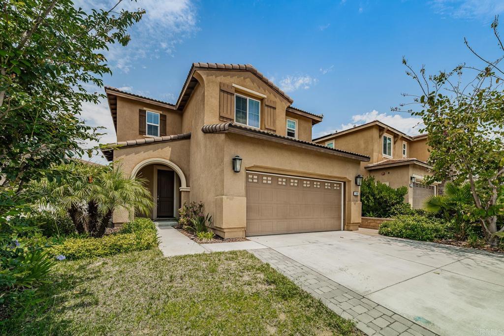 340 Falabella Lane Fallbrook, CA 92028 - Photo 3 of 63 a front view of a house with a yard