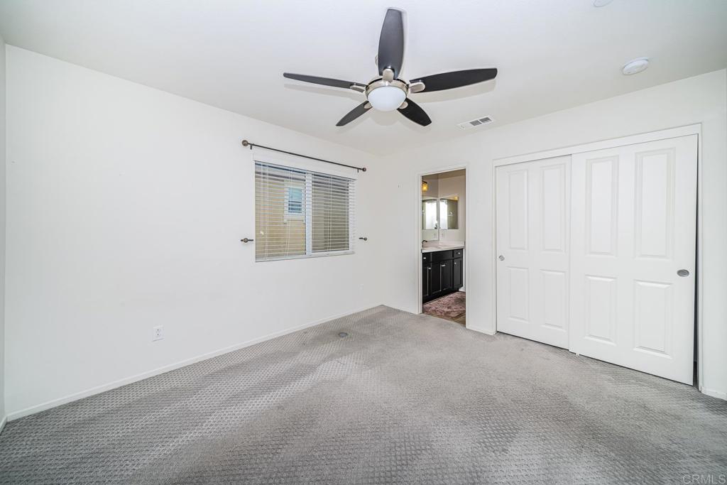 340 Falabella Lane Fallbrook, CA 92028 - Photo 40 of 63 a view of an empty room with a window