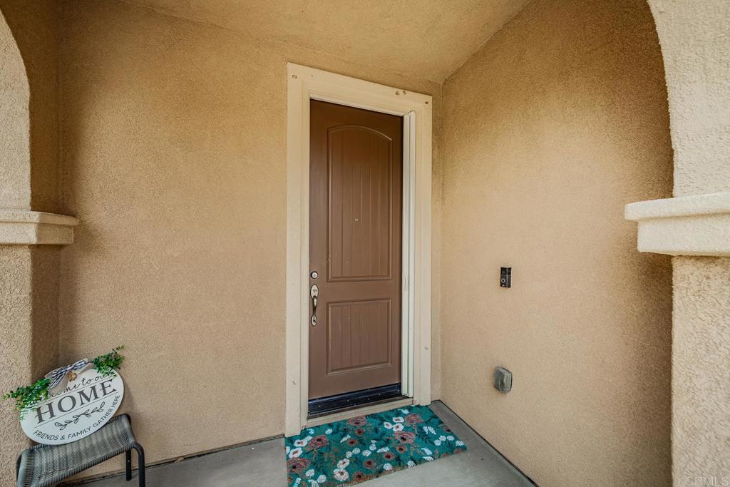 340 Falabella Lane Fallbrook, CA 92028 - Photo 4 of 63 a view of room with window and wooden floor