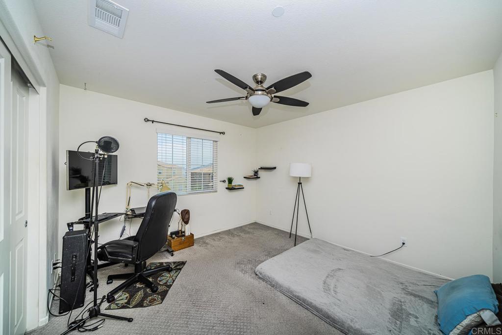340 Falabella Lane Fallbrook, CA 92028 - Photo 43 of 63 a view of a workspace with furniture and a window