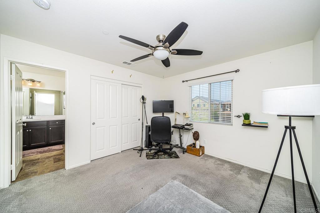 340 Falabella Lane Fallbrook, CA 92028 - Photo 44 of 63 a living room with furniture and a window
