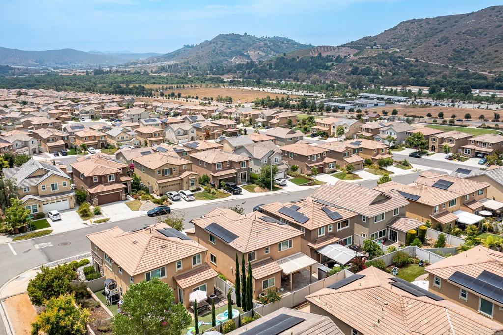 340 Falabella Lane Fallbrook, CA 92028 - Photo 60 of 63 an aerial view of residential houses with outdoor space and mountain view