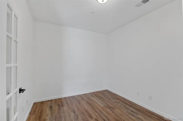 a view of small space with wooden floor