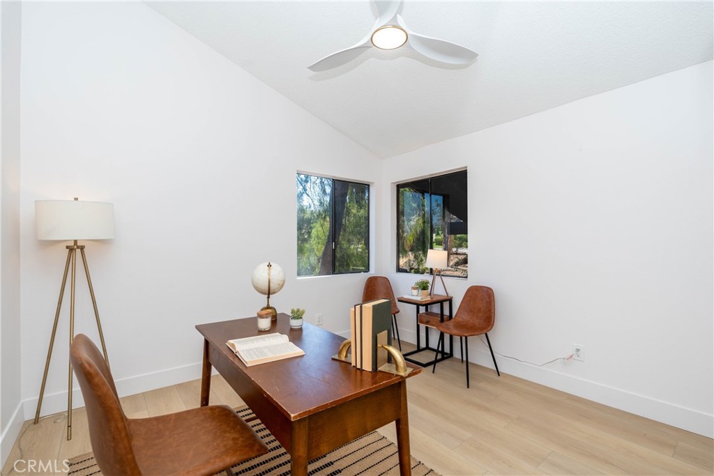 16066 Rancho Verde Circle Riverside, CA 92506 - Photo 12 of 29 a view of a workspace with furniture and a window