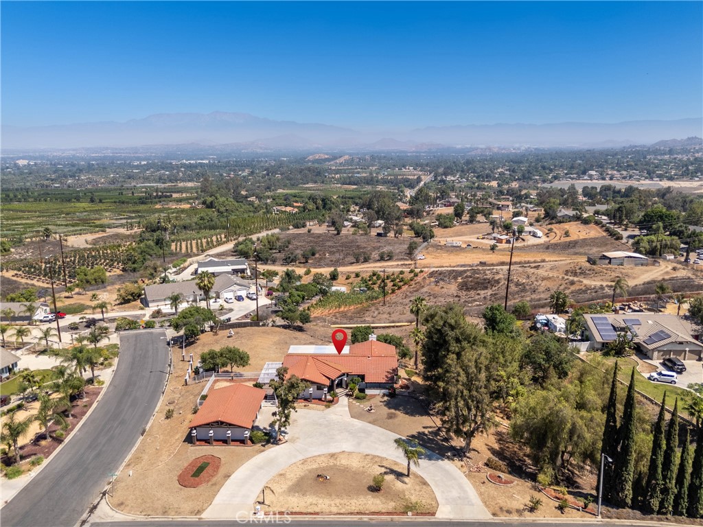 16066 Rancho Verde Circle Riverside, CA 92506 - Photo 29 of 29 an aerial view of a city with lots of residential buildings