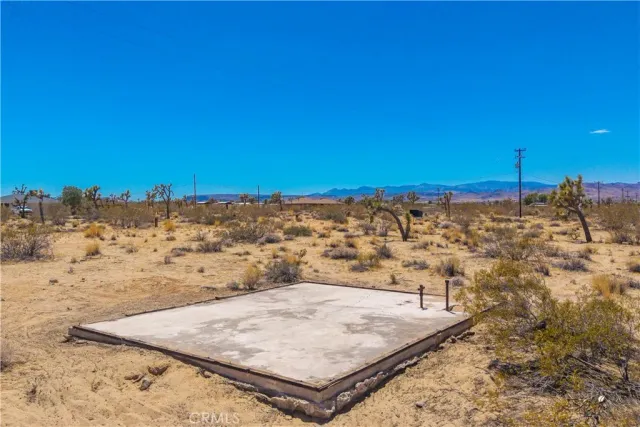a view of outdoor space yard and mountain view