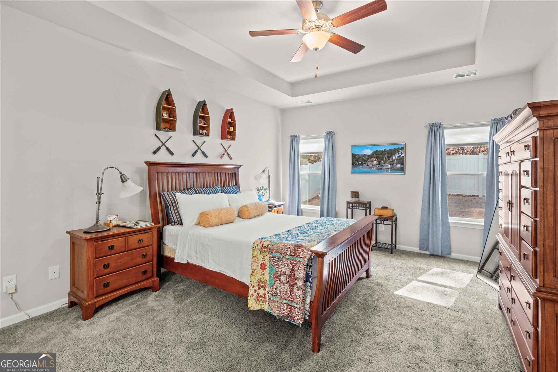 60 Light Lane Oxford, AL 36203 - Photo 20 of 45 a bedroom with a bed and a chandelier