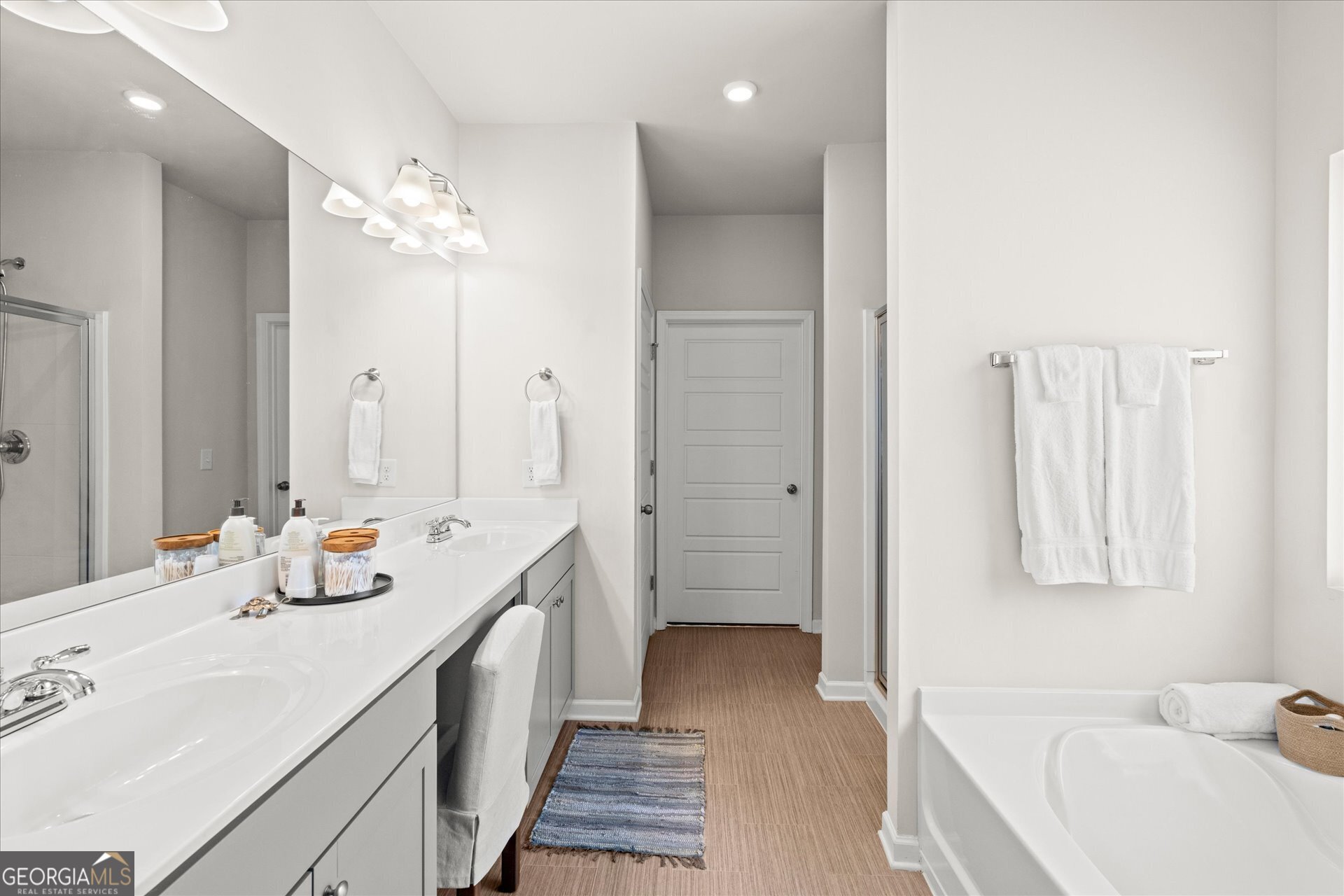 60 Light Lane Oxford, AL 36203 - Photo 24 of 45 a bathroom with a tub sink and mirror