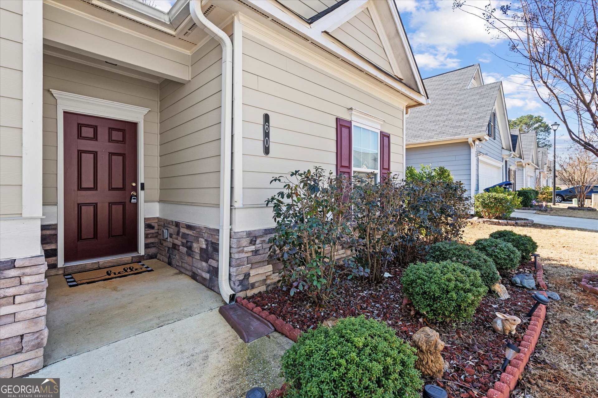 60 Light Lane Oxford, AL 36203 - Photo 3 of 45 a front view of a house with garden