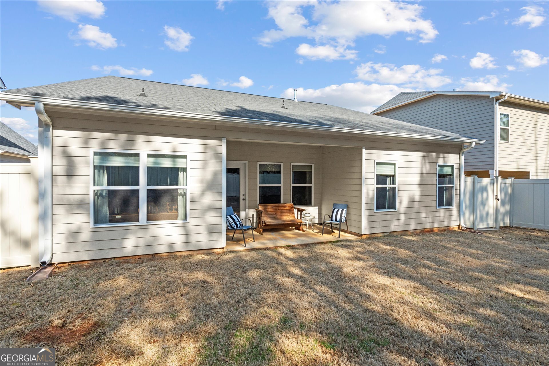 60 Light Lane Oxford, AL 36203 - Photo 38 of 45 a view of a house with backyard sitting area and porch