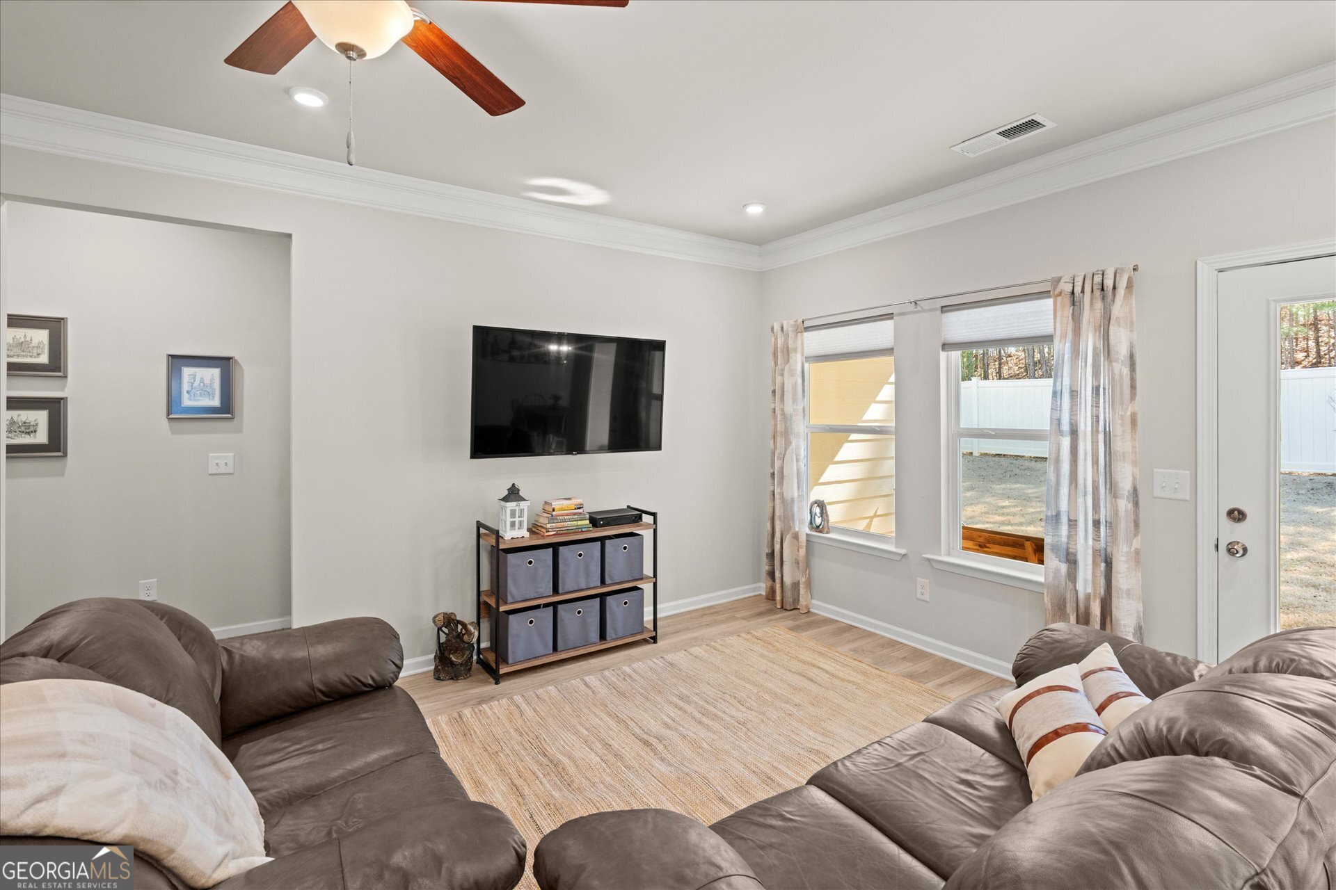 60 Light Lane Oxford, AL 36203 - Photo 9 of 45 a bedroom with a bed television window and couch