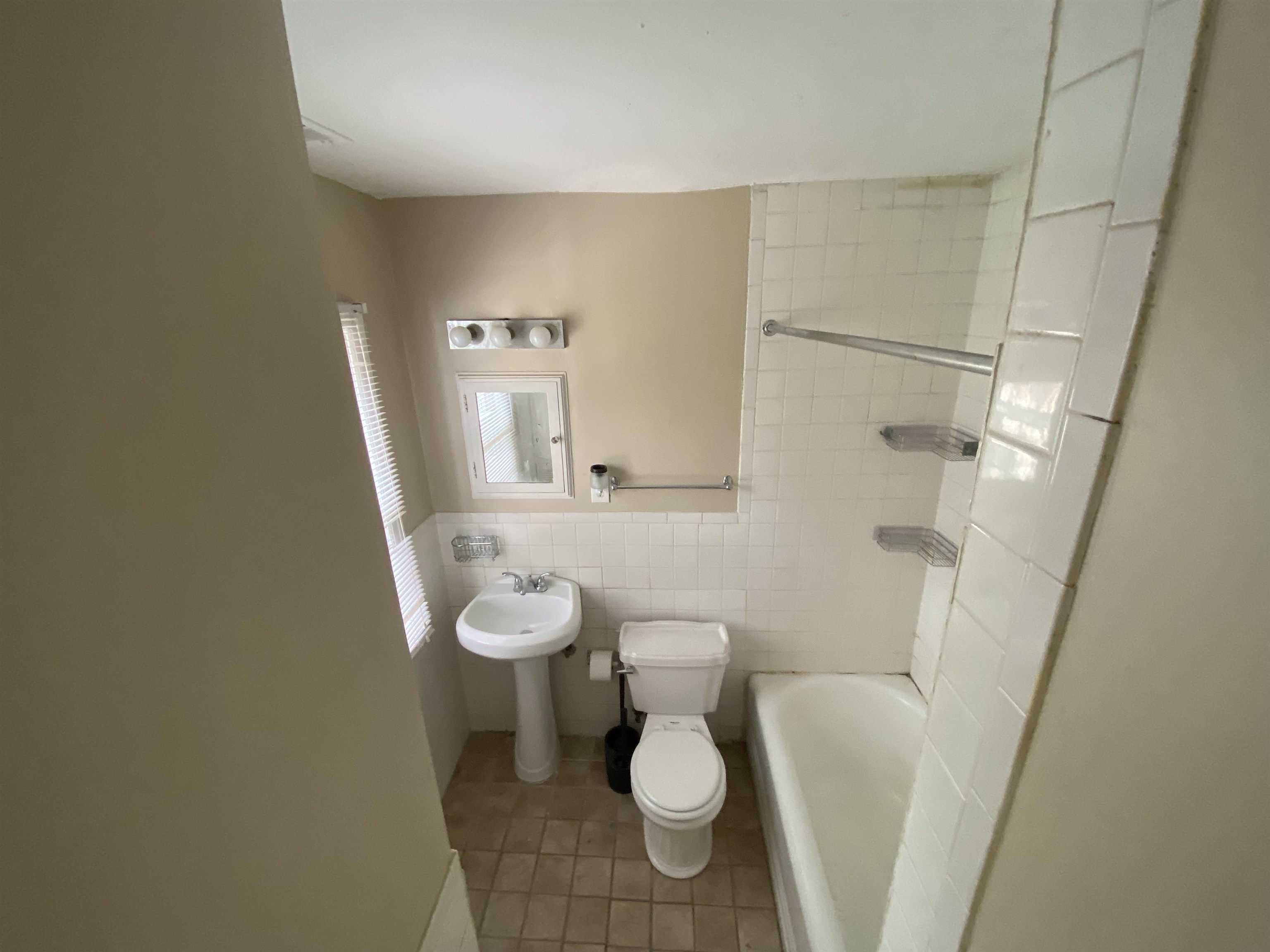 648 Loeb Street Memphis, TN 38111 - Photo 8 of 18 a bathroom with a sink and toilet