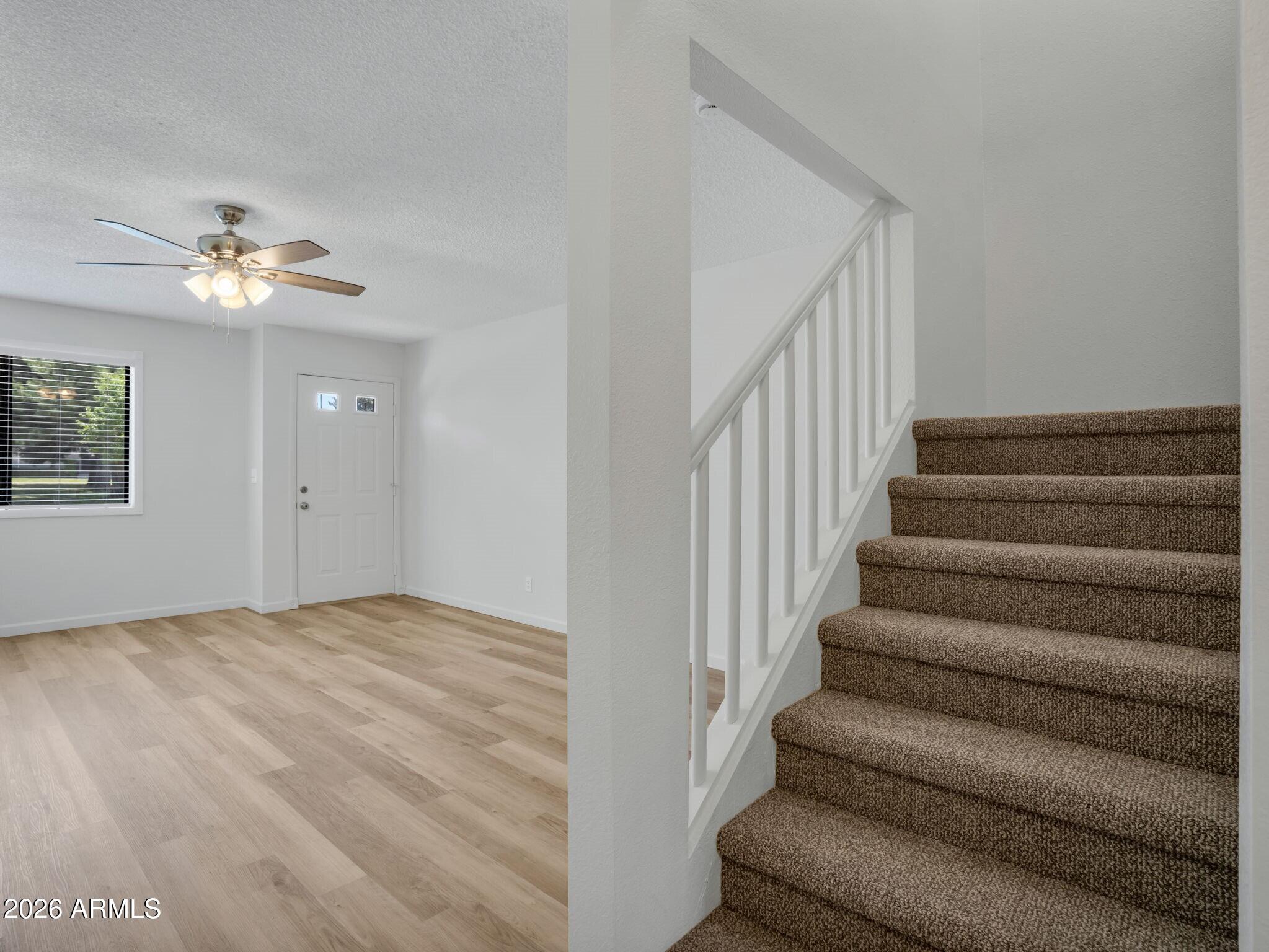 371 Rim Rock Circle, Unit 2 Prescott, AZ 86303 - Photo 19 of 36 020_Stairway to 2nd Level
