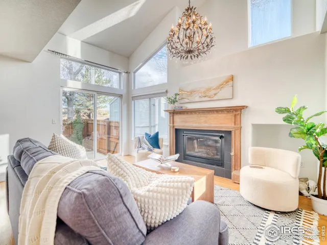 a bedroom with a bed and a fireplace