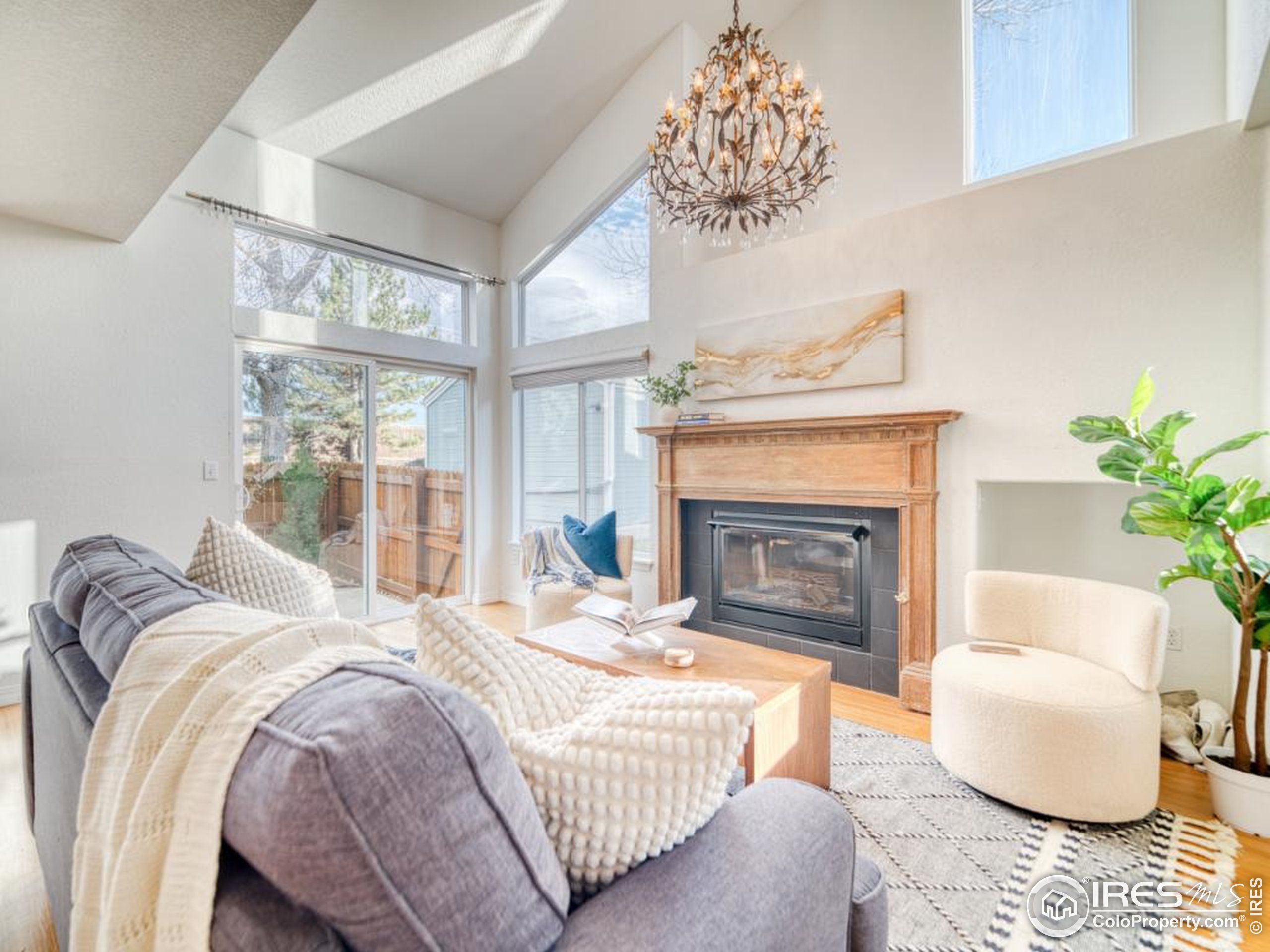 a bedroom with a bed and a fireplace